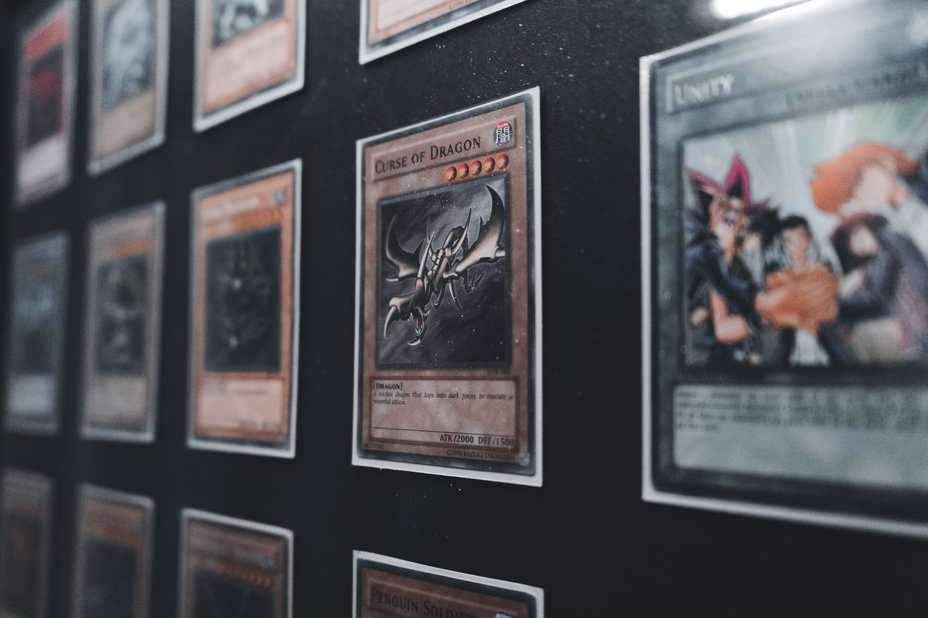 Collectible trading cards in a display case